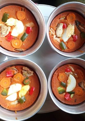 A picture of Plates Moimoi with boiled Eggs.