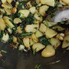 Potato spinach bhaji A picture of Potato spinach bhaji.