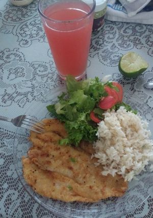 A picture of Fried Fish Fillets with a Hint of Garlic and Onion.