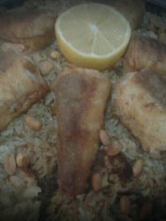 صورة لوصفة مقلوبة سمك 🐟🍚