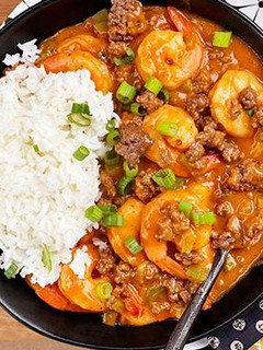 A picture of Etouffee with Wagyu Beef Cajun Sausage.