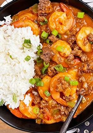 A picture of Etouffee with Wagyu Beef Cajun Sausage.