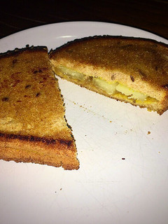 Una foto de Sándwich de queso con mostaza