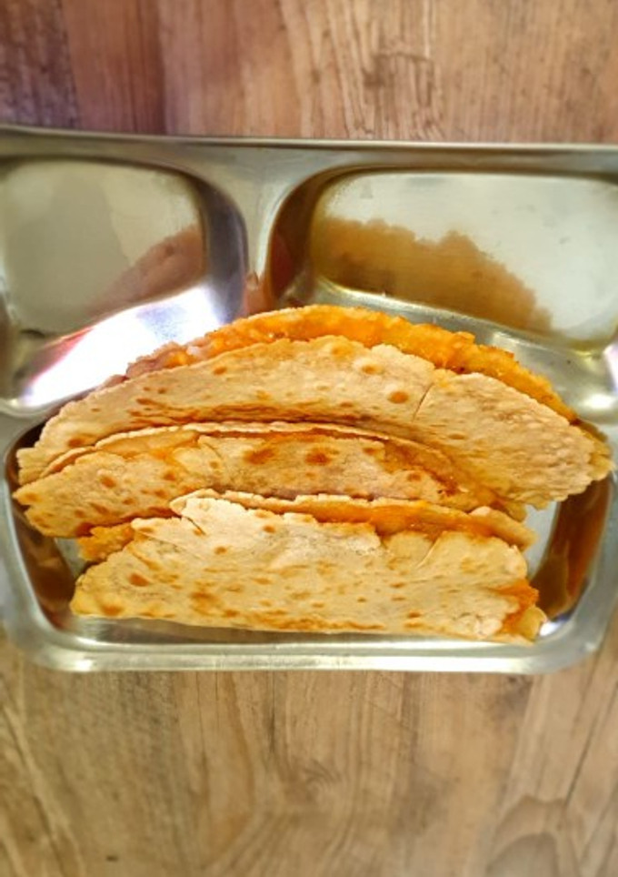 A picture of Homemade Instant Taco 🌮 (leftover chapati/wheat bread).