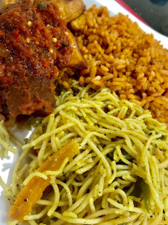 A picture of Spagetti and jollof rice.