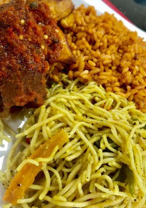 A picture of Spagetti and jollof rice.