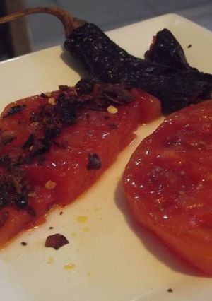 Una foto de Sandía asada con miel de maguey, limón y chile pasilla para pescado