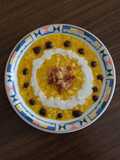 Risotto con crema di zucca, guanciale croccante, crema di pecorino ed emulsione all'aglio nero