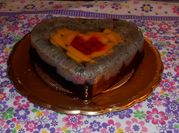 Una foto de postres frutas en almibar