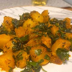 A picture of Potato and fenugreek leaf curry.