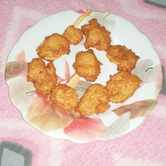 A picture of Pulses and potato fritters/ Daal and potato pakore.