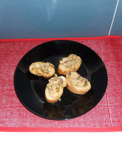 Una foto de Champiñones en vinagre