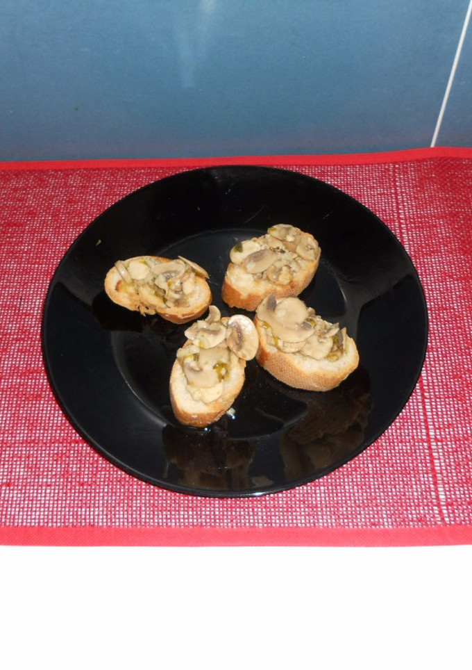 Una foto de Champiñones en vinagre