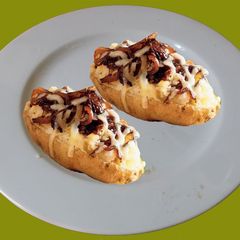 A picture of Yummy cheesy baked potatoes.