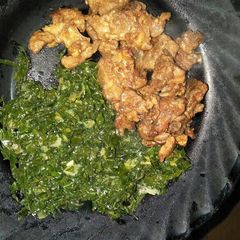 A picture of Wet fried beef with Kales.