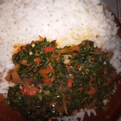 White rice and vegetable sauce A picture of White rice and vegetable sauce.