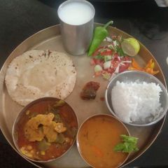 A picture of Gujarat Spoon Valor dhokli nu shake and hum platter.