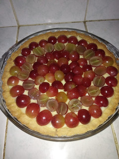 Una foto de Tarta de frutas con relleno de crema pastelera