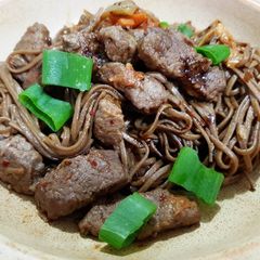 A picture of Fried Soba Noodles with Beef.