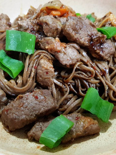 A picture of Fried Soba Noodles with Beef.