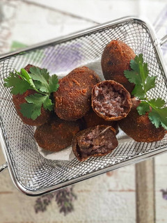 Una foto de Croquetas negras (morcilla de arroz) con MyCook touch