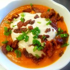 Sweet Potato Soup With Maple Sour Cream and Candied Bacon A picture of Sweet Potato Soup With Maple Sour Cream and Candied Bacon.