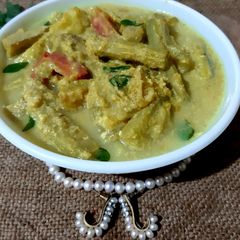 A picture of Avial Kerala style mixed vegetable curry with coconut & curd.