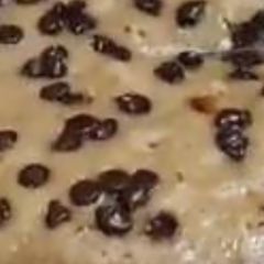 A picture of Banana walnut choco chip cake eggless.