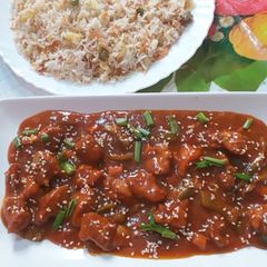 A picture of Chicken mancunian with Chinese rice.