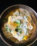 Poached eggs with curd and buttersauce. (Turkish Menemen)