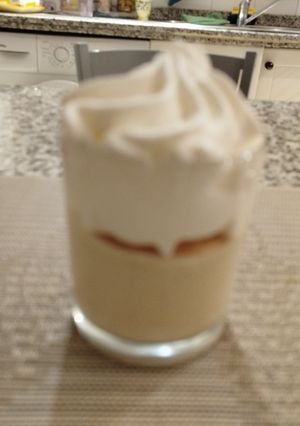 Una foto de Tarta de queso con cuajada Royal sabor crema de cacahuetes y pistacho entera o individual