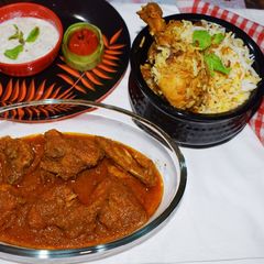 A picture of Kolkata Style Chicken Biryani.