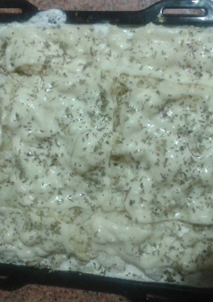 Una foto de Coliflor muy fácil gratinada con nata líquida queso y orégano
