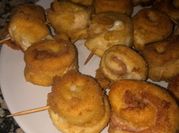 Una foto de rollitos pollo queso