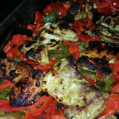 A picture of Baked Honey-Mustard Chicken Thighs with Roasted Peppers.