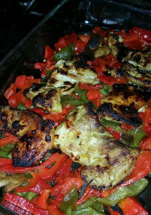 A picture of Baked Honey-Mustard Chicken Thighs with Roasted Peppers.