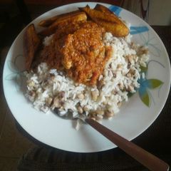 A picture of Stewed Rice, beans and plantain.