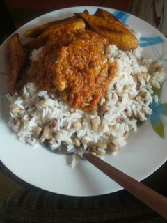 A picture of Stewed Rice, beans and plantain.