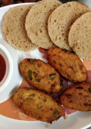 A picture of Corn kabab With brown bread.