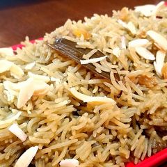 A picture of Gur waley Chawal/ Jaggery rice.