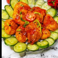 A picture of Chicken tandoori momos.