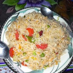 A picture of Chicken fried rice.