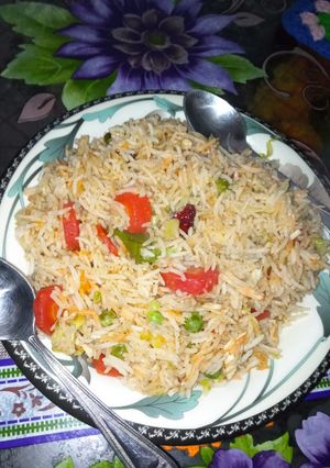 A picture of Chicken fried rice.