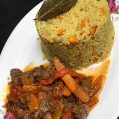 A picture of Fried rice with shredded beef soup.