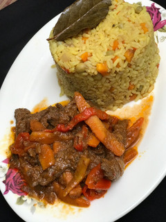 A picture of Fried rice with shredded beef soup.