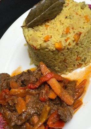 A picture of Fried rice with shredded beef soup.