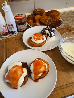 Una foto de Papanasi (Donas de queso dulce)