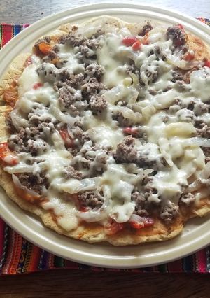 Una foto de Pizza casera a la sartén