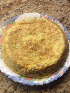Una foto de Tortilla de arroz con pollo y gambas