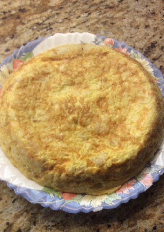 Una foto de Tortilla de arroz con pollo y gambas